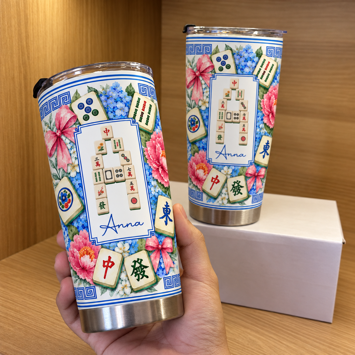 Hand holding a stainless steel Mahjong Tile Number Floral Tumbler with a custom name and vintage floral design.
