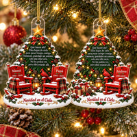 Two Spanish memorial Christmas tree acrylic ornaments featuring red rocking chairs, cardinals, and Navidad en el Cielo text.