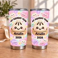 Two My Squishy Year tumblers with kawaii bao bun design, custom name Amelia and year 2026 on a wooden surface.