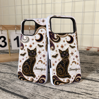 Two custom name phone cases featuring a glossy finish with black cat and celestial gothic design against a white textured