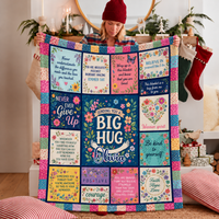 Woman holding The Difference You Made Blanket with custom name Olivia in living room.