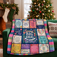 Personalized appreciation blanket draped over a green velvet sofa by a Christmas tree.