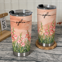 Two personalized pastel tumblers featuring watercolor gladiolus flowers, a textured peach background, and the name sophia in