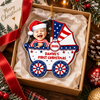 Customer in Austin, Texas wearing Patriotic Baby Carriage Ornament Personalized First Christmas Keepsake for Boys and Girls