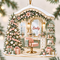 Close-up of the house-shaped acrylic ornament with pastel salon interior, pink chair, and custom name Emily