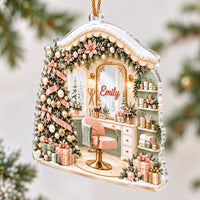 Close-up shot of the custom name Christmas ornament hanging on a pine tree branch