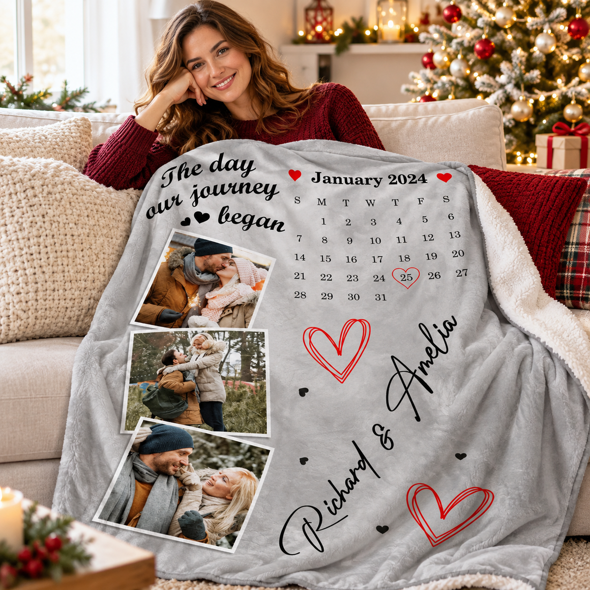 A woman smiling while relaxing on a couch with a custom photo blanket featuring couple pictures and a calendar.