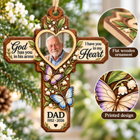 Detail view of a Memorial Cross Wood Ornament showing the flat wood-grain edge and printed butterfly artwork.