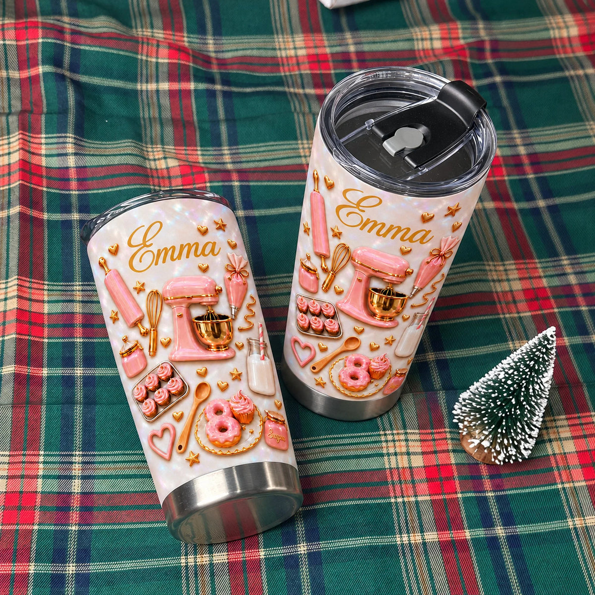 Two personalized baker gift tumblers resting on a green and red plaid cloth