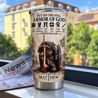 Full Armor Of God tumbler with male knight graphic and name Matthew displayed in front of a blurry urban window.