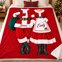 Santa and Mrs Claus Costume Couple Blanket laid flat on a plush white bed with pillows and holiday decor