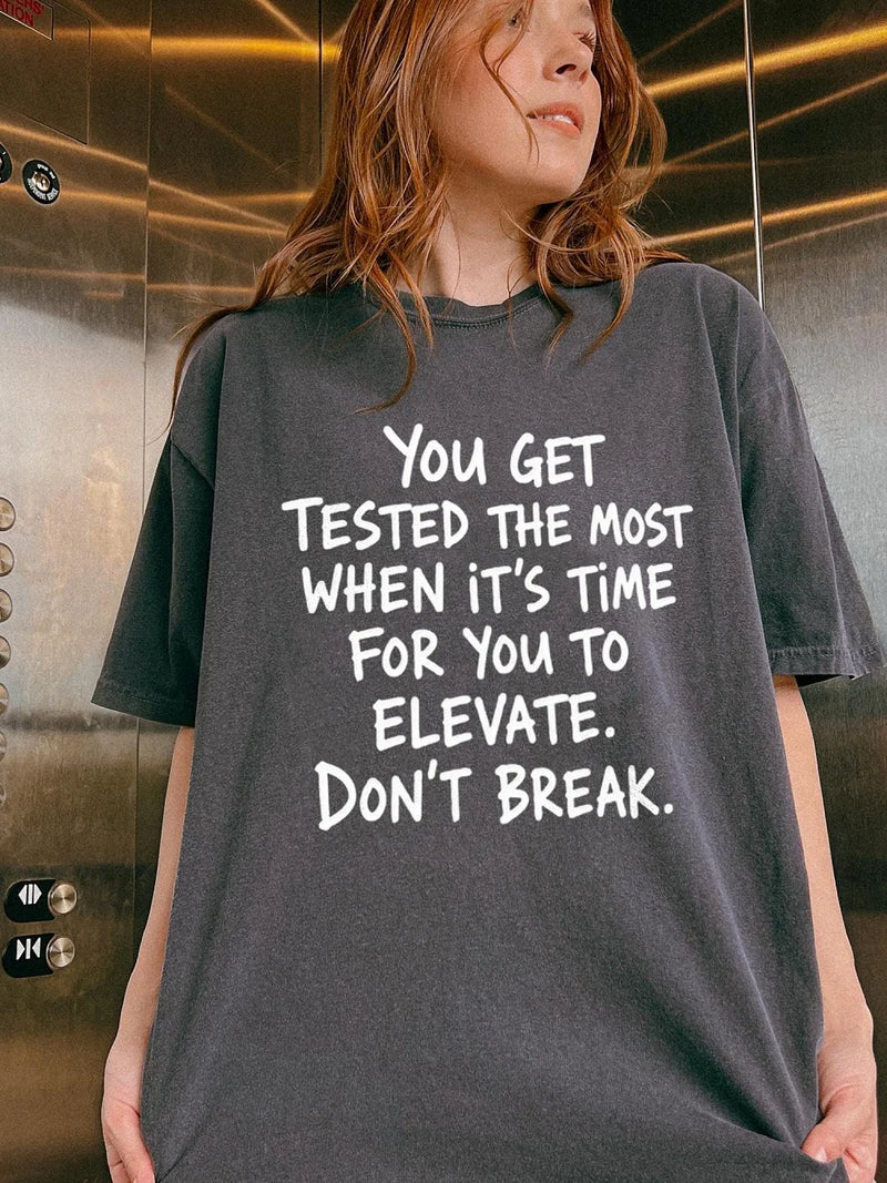 You Get Tested The Most Motivational T-Shirt Elevate Don't Break Quote Tee