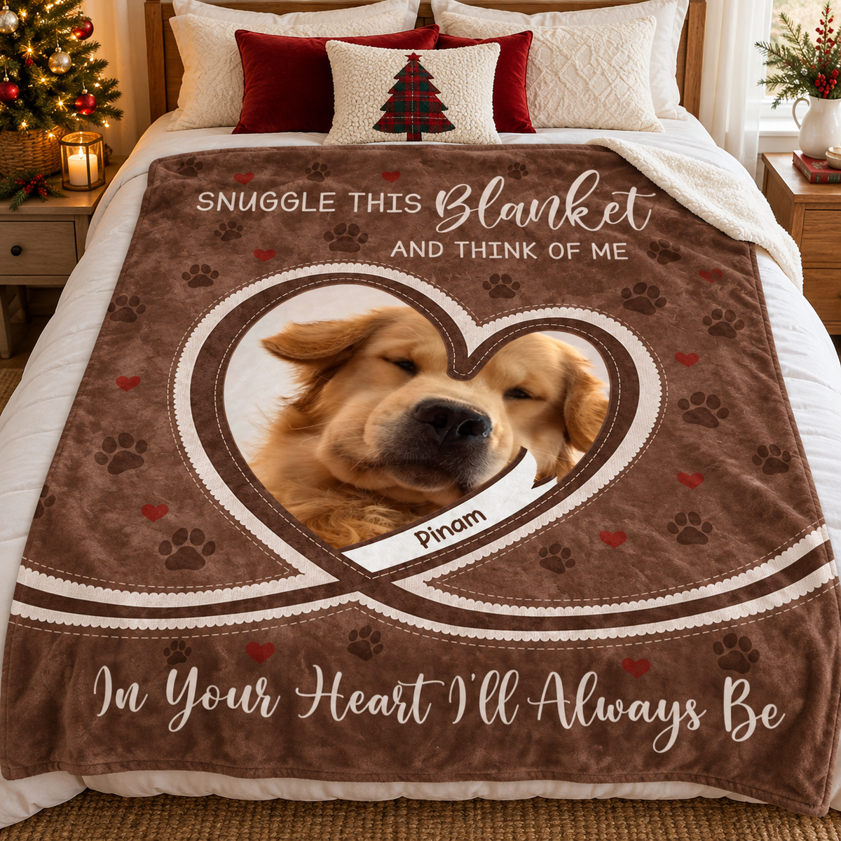 A custom brown fleece throw blanket with dog photo and memorial text, displayed neatly on a white made bed.