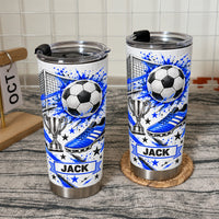 Two blue soccer tumbler personalized custom name cups with black lids displayed against a white tiled wall.