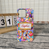 Personalized makeup phone case displaying custom name Sophia and stained glass mosaic art near wooden calendar on grid wall.