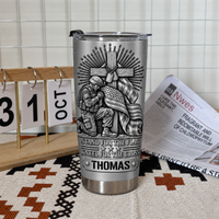 A Christian patriotic tumbler with name Thomas standing upright on a textured mat.