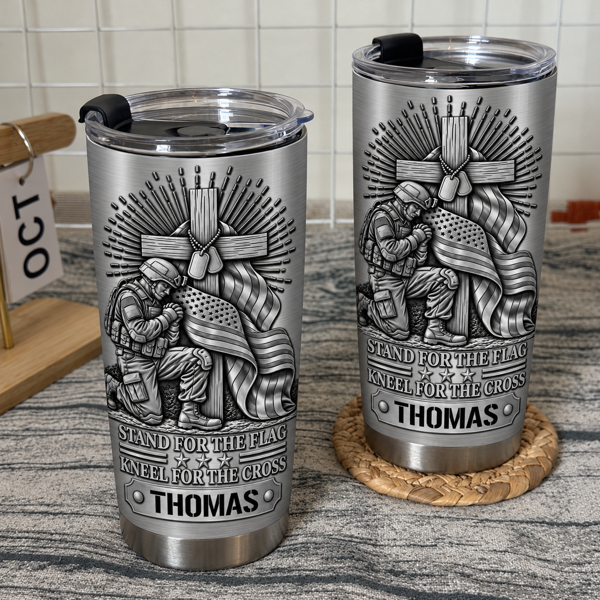 Two Christian patriotic tumblers with custom name Thomas on a rustic wood surface.