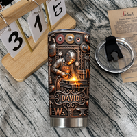 Stainless steel travel tumbler with steampunk welder graphic and custom name David on textured surface.