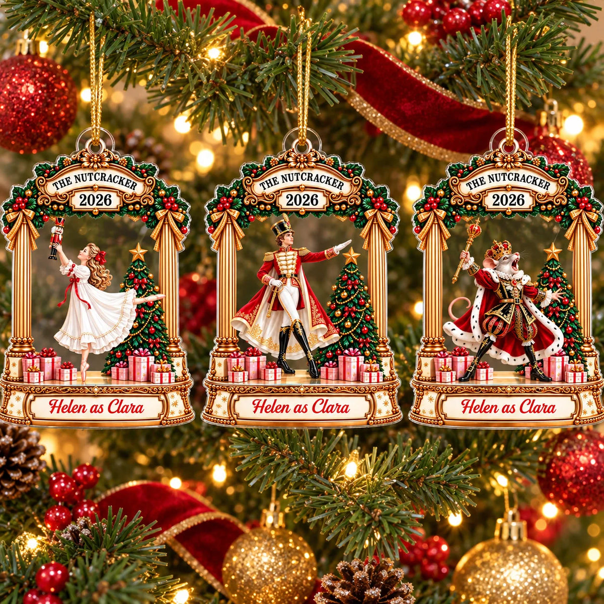 Three personalized Nutcracker acrylic ornaments hanging on a Christmas tree, featuring Clara, the Soldier, and the Mouse