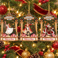 Three personalized Nutcracker acrylic ornaments hanging on a Christmas tree, featuring Clara, the Soldier, and the Mouse