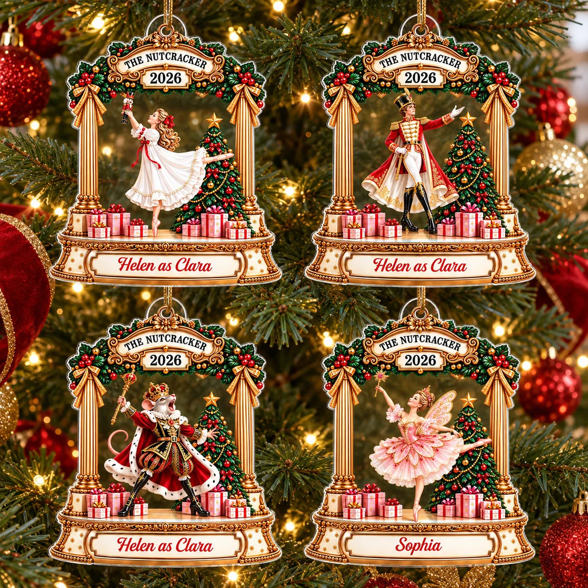 Four personalized Nutcracker acrylic ornaments hanging on a Christmas tree, featuring Clara, Soldier, Mouse King, and Sugar