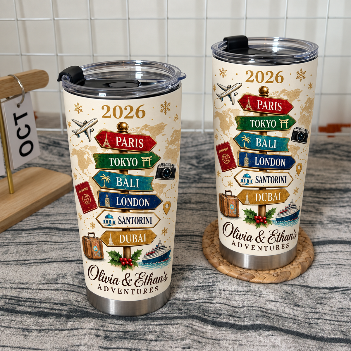 Two custom travel bucket list signpost tumblers with a cream background and travel icons displayed on a wire grid background.