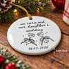 Customer in Austin, Texas wearing We Survived Our Daughter's Wedding Ornament Personalized White Ceramic Christmas Keepsake Gift for P