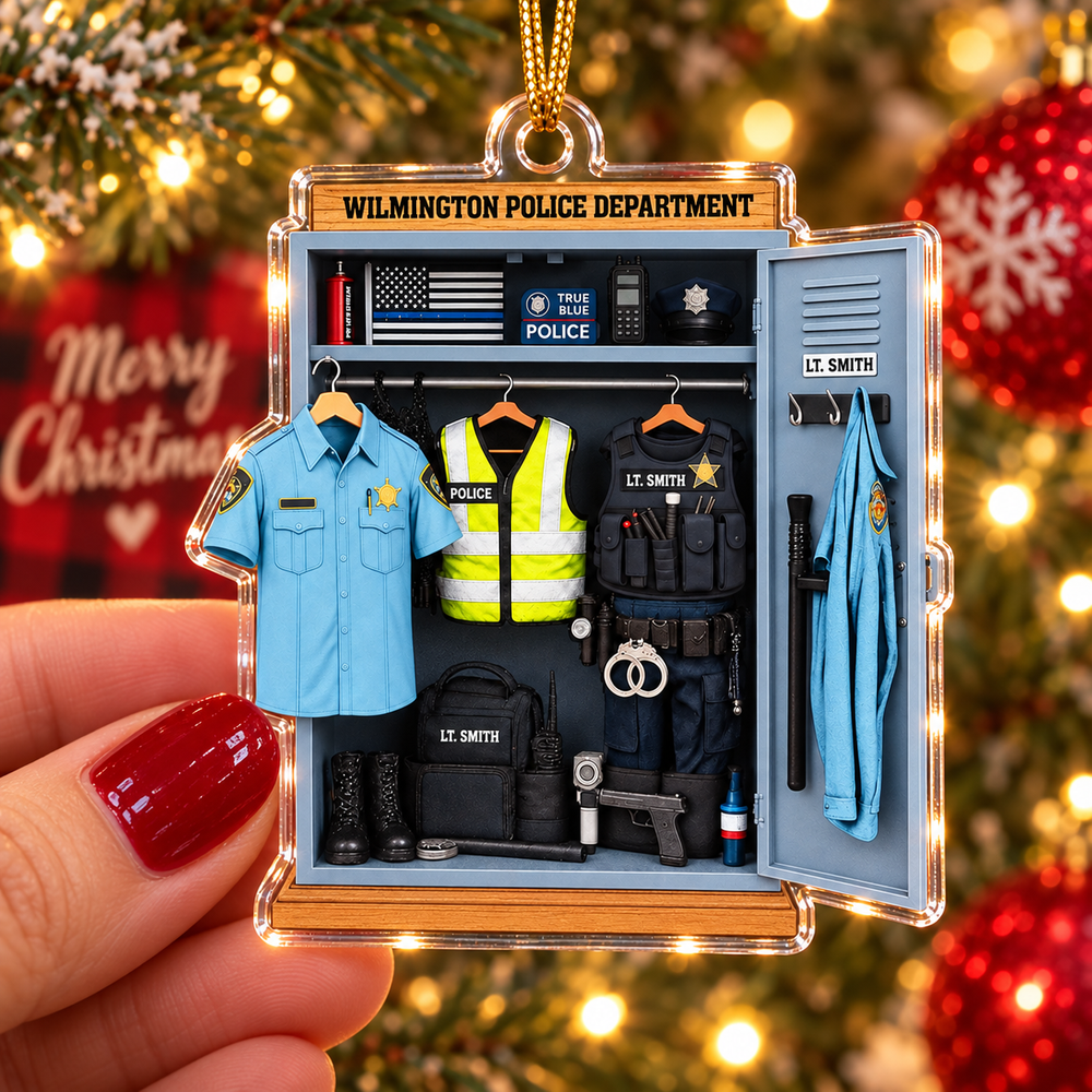 Hand holding Wilmington Police Department true blue flat acrylic ornament showing detailed cop locker graphic against